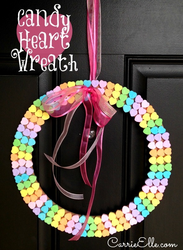 I have GOT to make one of these DIY Candy Heart Wreaths by Carrie Elle. OMG!